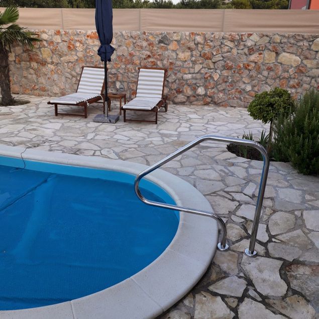 We made a little upgrade to our pool and pool area.A chromium handle, for easier entry to the pool and tent screen for privacy protection of our guests.We hear our guests suggestions!!